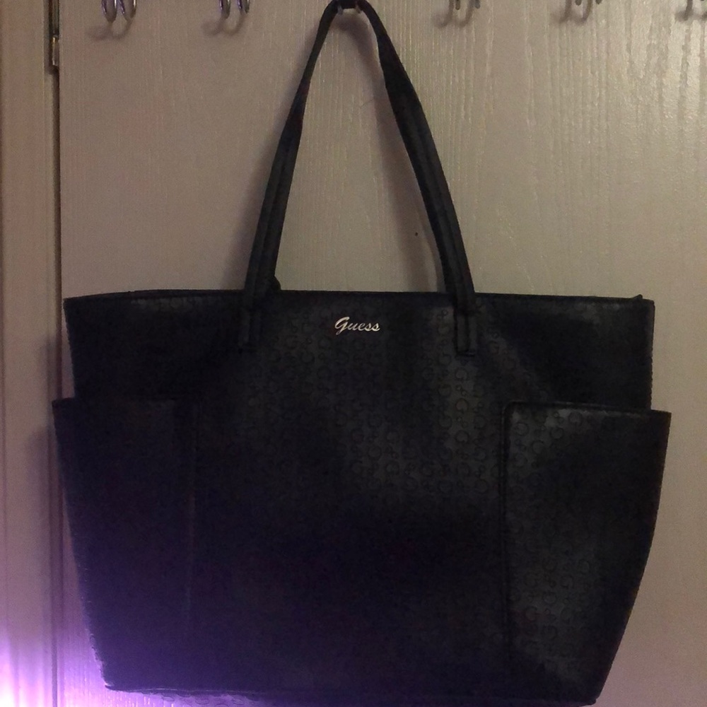Black embossed Guess purse